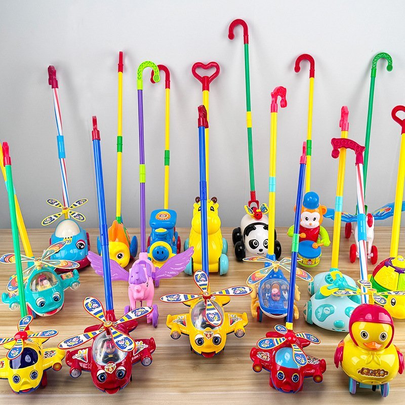 Push along rotary rotor toys